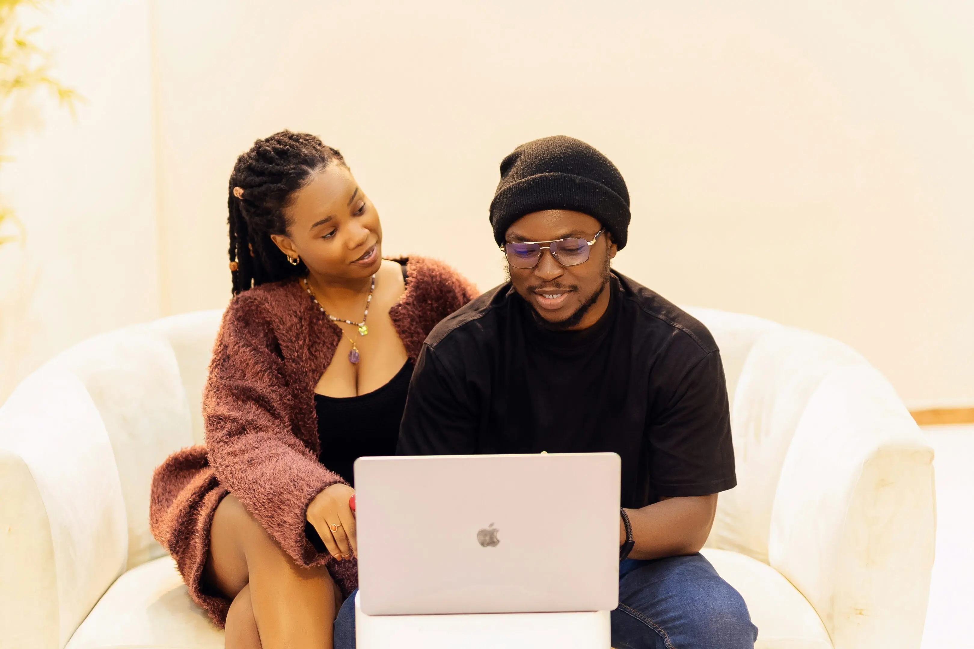 couple sitting at a computer for virtual counseling session