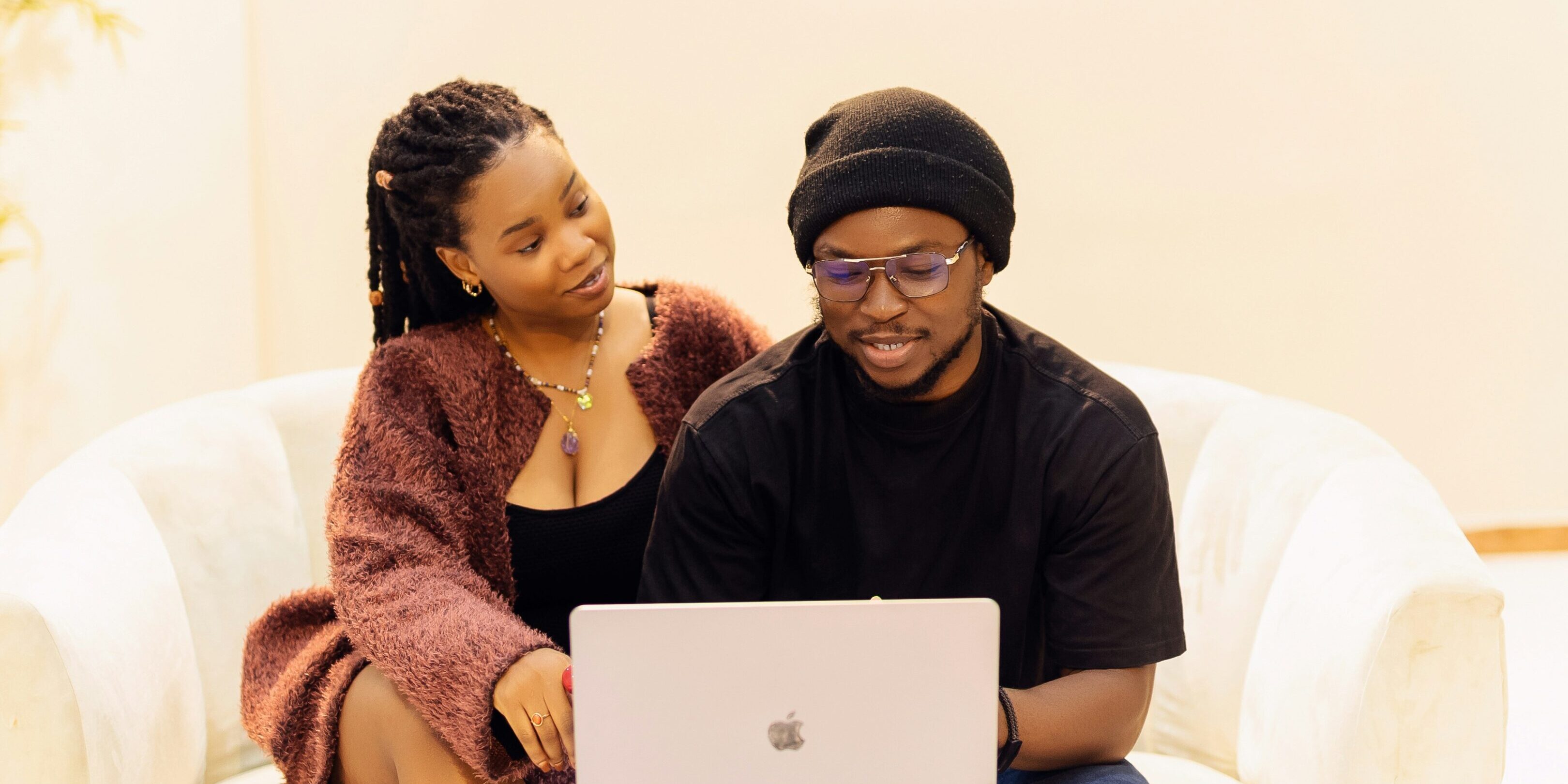 couple sitting at a computer for virtual counseling session